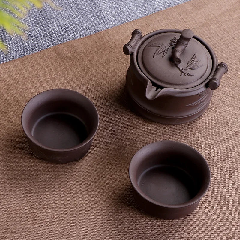 Hot sale one purple sand teapot two cups travel tea set